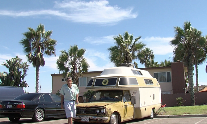 RV camper on Dog Beach shown on KPBS - Image by Matt Bowler