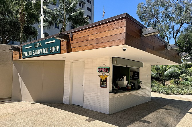 A small box of a sandwich shop
