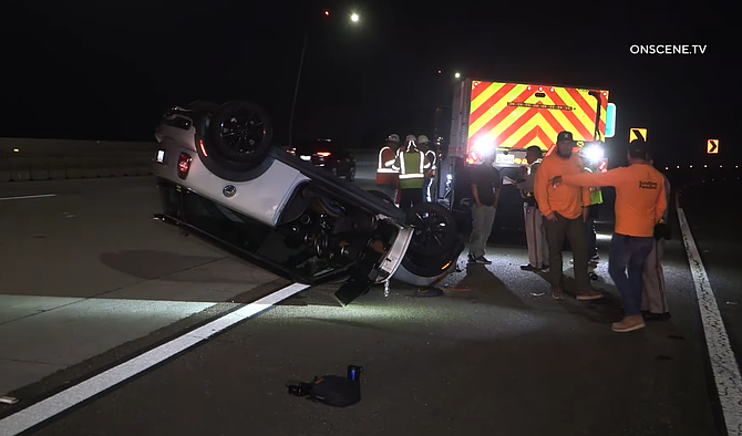 A Mini Cooper collided with a Caltrans street sweeper in the HOV lanes of the 15 freeway.