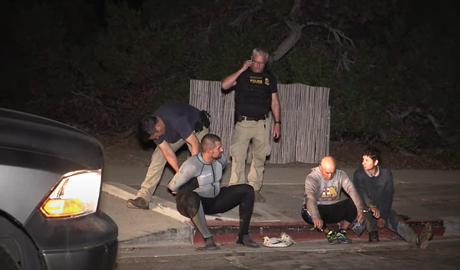 The jet skiers were apprehended after attempting to flee up a staircase at Sunset Cliffs.