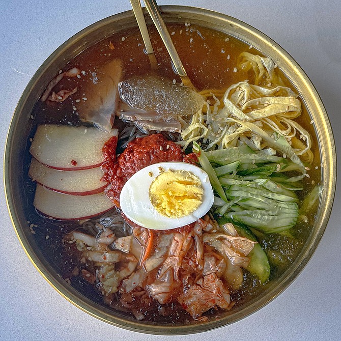 Naengmyeon ("cold noodles"), served in ice cold broth with veggies, meat, and boiled egg