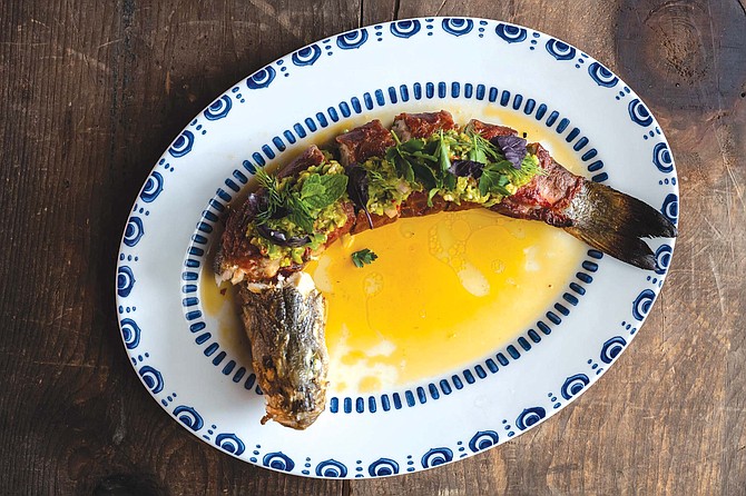 Our critic’s favorite main: roasted branzino at Herb & Wood.