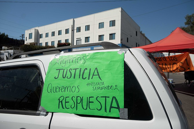 Translation: "We demand justice. We want an answer. (in smaller type: We miss Servando"