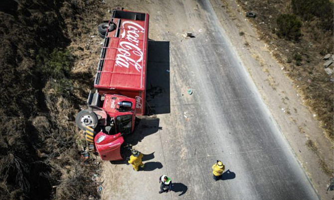 On September 11, a Coca-Cola truck rolled over on Corredor 2000 in Tijuana.