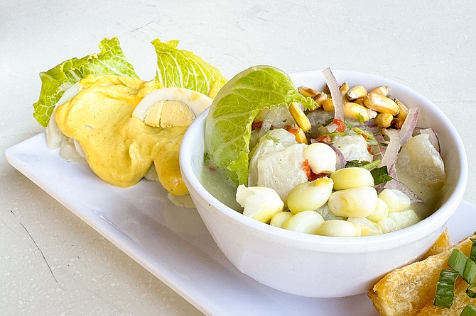 Papa a la huancaina (left) and fish (swap) ceviche, part of the Peruvian Sampler