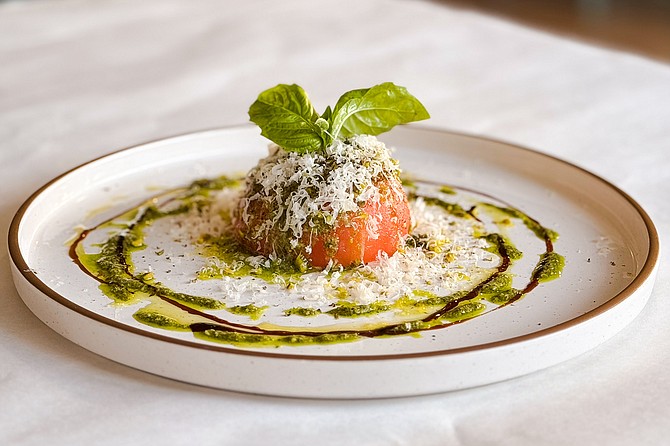 The Acqua e Farina caprese salad: an organic heirloom tomato stuff with burrata, served in basil pesto