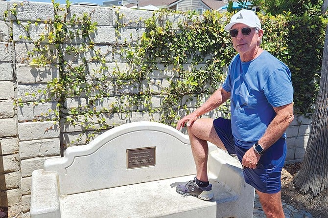 Dr. Pat Davis, one of the survivors who has fought hard to avenge the deaths of three women in his family, posed in front of their memorial bench for my camera.