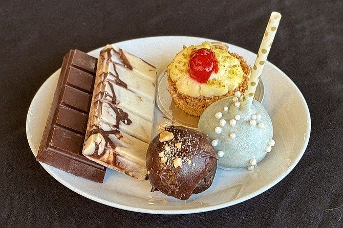 A selection of treats from Hakmi Sweets, including two types of Dubai chocolate