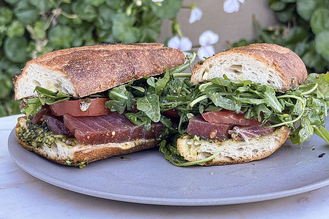 A different kind of fish sandwich: ahi tuna pastrami on a baguette. Served at La Clochette in Mission Valley.