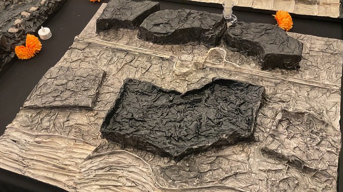 Alvarez’s papier maché sculpture of Trump Tower, still a hole in the ground after 16 years