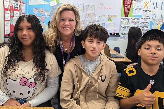 8th grade Standley Middle School AVID students, from left to right: Madison Galeana, Sebastian Nunez, and Logan Preston, with teacher Nikki Botts in the back center.