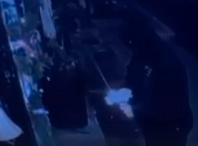 Security footage showing the cowardly criminal lighting a rag on fire before tossing it onto the display. Says Leftleaner, “You know, the Christian Bible has a line, ‘Men loved darkness rather than light, because their deeds were evil.’ You’d think these so-called religious people on the right would read their own book, you know? All I know is, you’d never see someone from the left attack something this way. But right-wingers are full of fear and hatred for the things they don’t understand, so they lash out.”