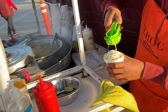 Angel squirts lime juice into my corn esquites cup. This is Mexico. Everything’s fresh.
