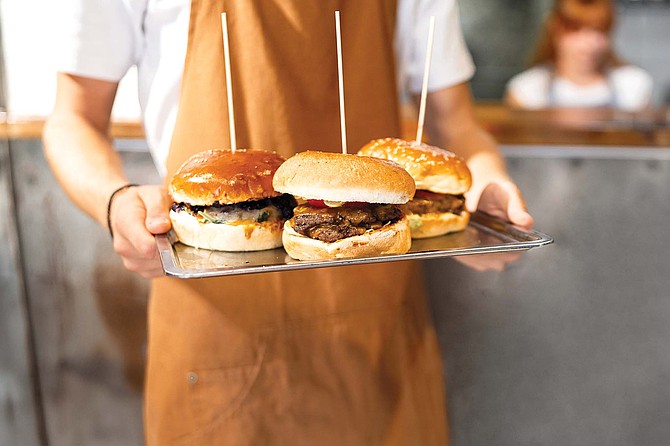 He said it would be easy work, taking orders and handing them out. And no dressing up either. Just show up, put on a funny hat and apron, and that was it.