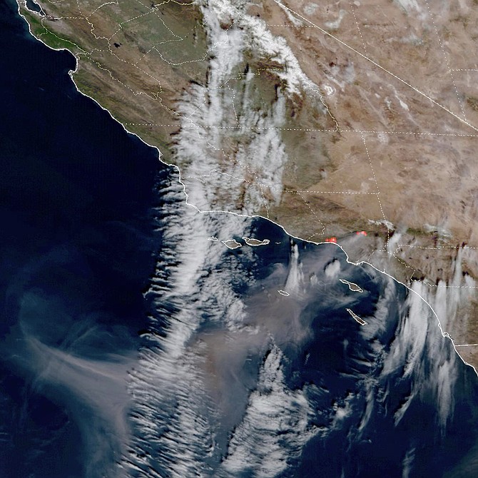 The Palisades and Eaton fires in the Los Angeles area as seen by the GOES18 satellite.