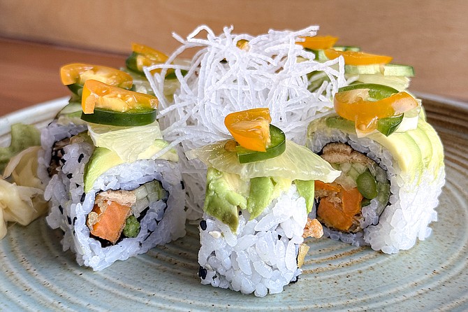 A vegan sushi roll, loaded with eight fruits and vegetables plus tofu