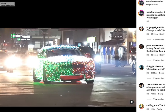Four-door sedan decorated with Christmas LED lights and honking. (Socalnewsoutlet)