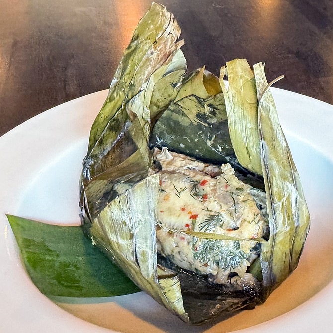 Mok Kai, chicken steamed in a banana leaf