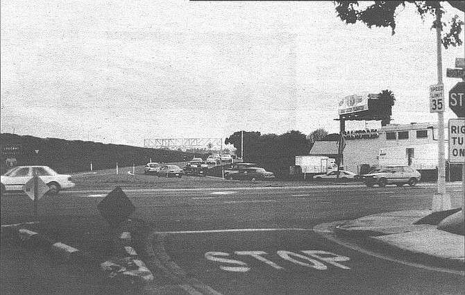 Looking northeast, across Sports Arena Blvd. Freeway ramp occupies the former spot of Nashville Street.