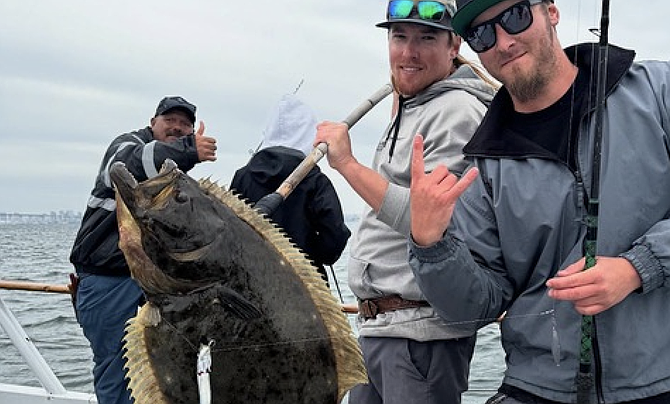 Hefty halibut pulled in on Dolphin during Wednesday's derby