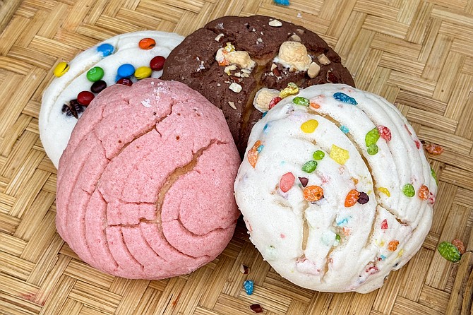 Strawberry, M&M, Rocky Road, and Fruity Pebbles flavored conchas