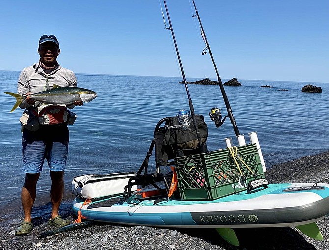 Kevin Trieu with his paddleboarded yellowtail from the Sea of Cortez near Bahia de San Luis Gonzaga.