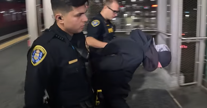 "We shouted and pointed out his location to officers, who then ran up the stairs and arrested the man just outside of the elevator, on the trolley platform.”