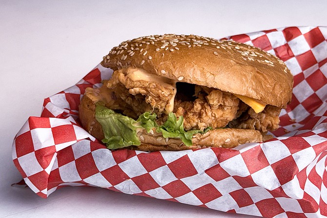 The "zinger burger" is really a fried chicken sandwich that became popular in South Asia and the Middle East before KFC introduced it here.