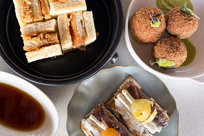 Tapas and global small plates best for sharing at Nómade Tapas and Records