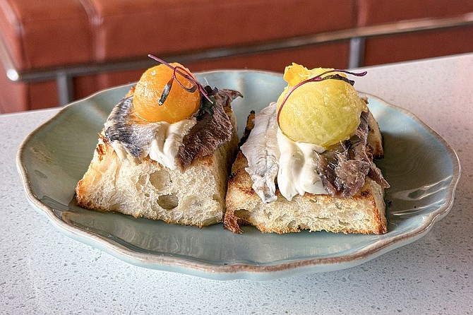 The "matrimonio": sourdough bread topped by cream cheese and anchovies