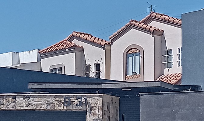 Bullet holes at the house where Cesar was located