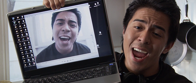 Aaron Zaragoza performs an imaginatively staged duet with himself.