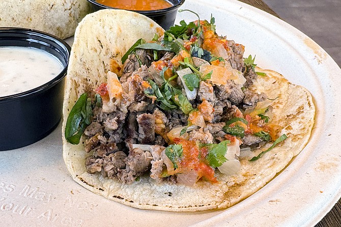 A carne asada taco made with halal beef