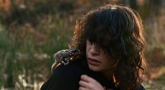 Squirrel meets girl: Bandit and Alexandra Faye Sadeghian.