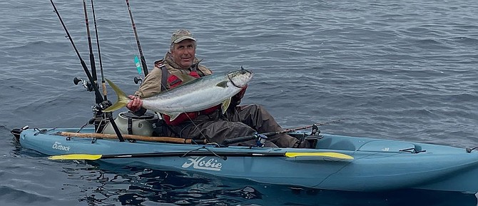 Matt Rabasco with a nice chunky yellowtail caught outside the reserve off La Jolla by kayak.