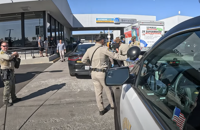 The female driver exited at Miramar Road, clipped a gas pump while cutting through a gas station, and led officers down the 163.
