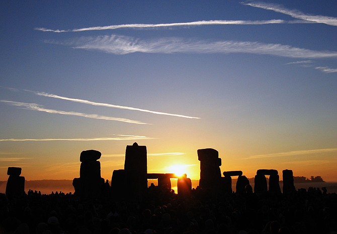 The Sun rising over Stonehenge in southern England on the June solstice.