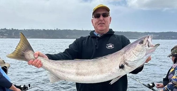 Solid coastal white seabass caught by this happy angler while fishing aboard the Daily Double.