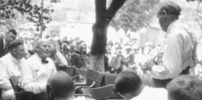 Clarence Darrow (right, standing) cross-examines William Jennings Bryan (left, seated) at the Scopes Monkey Trial, 1925