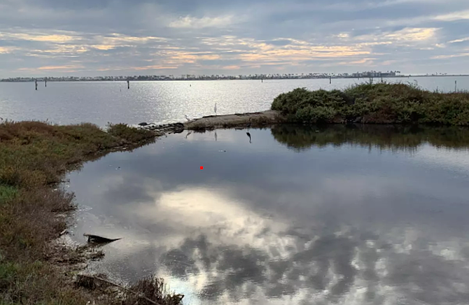 Wildlife refuge pond in disputed area