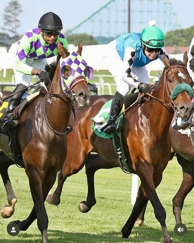 Sophia Barandela (right) racing against her fiancé Serafin Carmona (left)