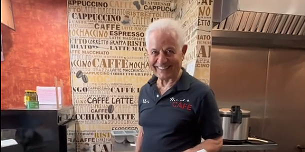 Max, still smiling on Mitra Cafe's last day.
