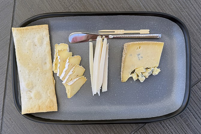 Butterbloom cheese from Oregon, Brabanter goat gouda from the Netherlands, and Jack's Blue cheese from Vermont