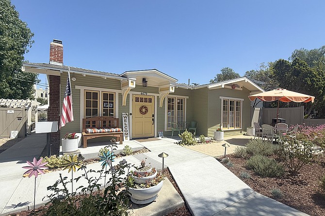A cheese shop within a refurbished home in La Mesa