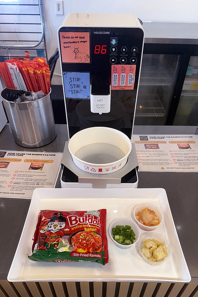A new-fangled ramen cooker offers two-button cooking of three types of instant noodles: thin, thick, and dry