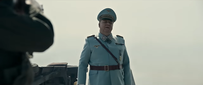 Five-foot-two, clad in blue, hopes his lawyer is a Jew, will Oscar smile on Gö-ö-ring?