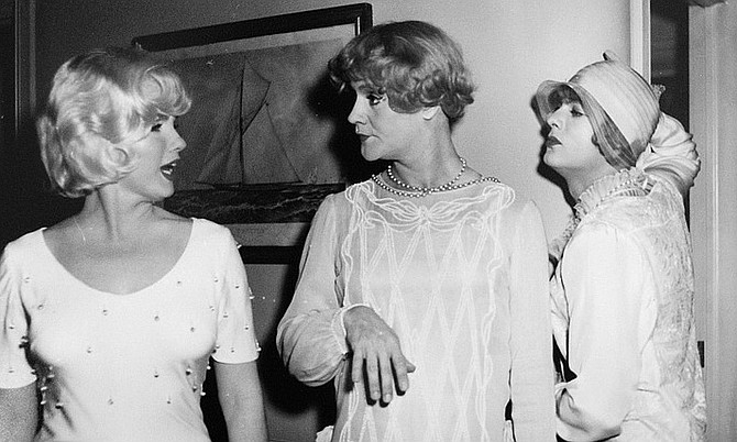 Marilyn Monroe, Jack Lemmon, and Tony Curtis. The saxophone-toting glamour-boy Joe, played by Curtis, and his buddy, the bass fiddle–plucking neurotic Jerry, played by Lemmon, are broke and desperate.