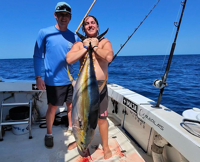 Angler with a nice yellowfin tuna caught outside of Puerto Vallarta while fishing with Marla’s Sportfishing.