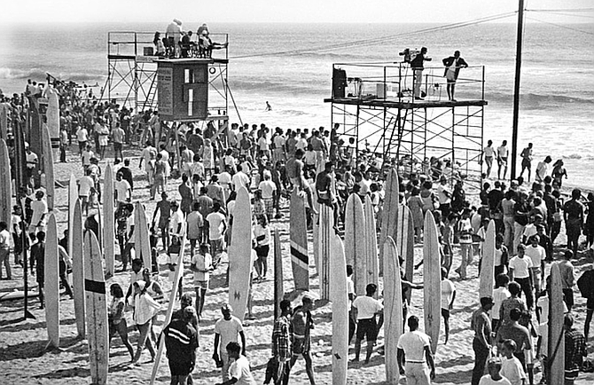 Kahanamoku surfed the OB Pier, and when he did, he asked a teenaged lifeguard named Charlie Wright if he could store his board in Wright's beach shack. Wright asked if he might try the board. "So Charlie surfed the board and also got the dimensions and later copied it."