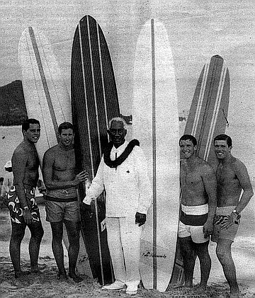 Grandfather of surfing Duke Kahanamoku and his surf team, c. mid-'60s; Van Artsdalen on far right.